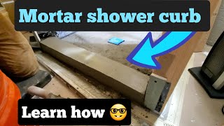 How to  mortar a shower curb.