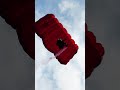 Chinese wingsuit flyer Zhang Shupeng passes through target during flight event