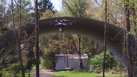 High-speed Autonomous Aerial Navigation through Quonset Hut