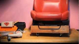 This was a leather car seat I got off a wrecker. Very comfy and begging for a new home. With some timber and some castors, its a 