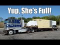 Cabover Peterbilt With Completely Full Trailer