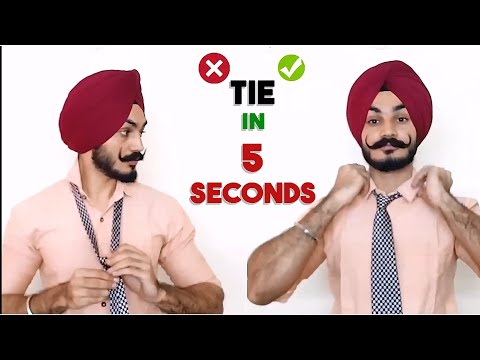 वीडियो: टाई कील पहनने के आसान तरीके: 9 कदम (चित्रों के साथ)