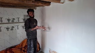 The whitewashing of Ali's dream cabin in the heart of the wild mountains is complete.