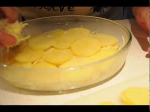 Video: Cómo Cocinar Una Cazuela De Patatas Con Queso En El Horno