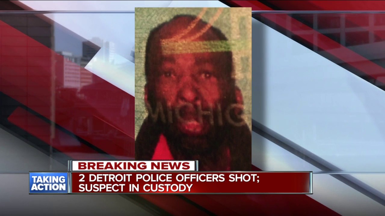 Two Detroit police officers shot, suspect in custody - YouTube