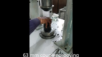 Coupler grooving machine