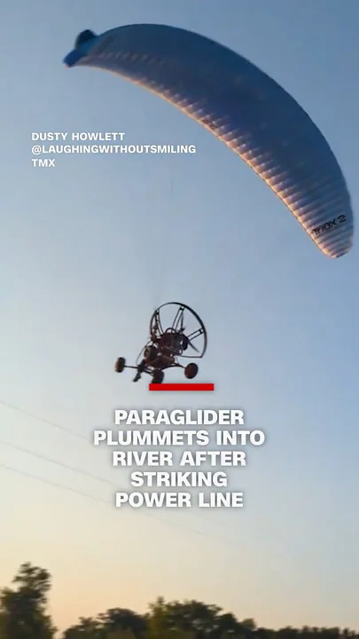 Paraglider plummets into river after striking power line