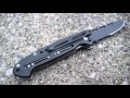 Mtech xtreme black tactical knife with cutouts