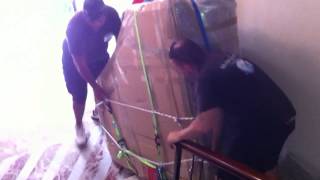 empresa mudanza palma de mallorca bajando piano