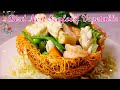 Bird nest stirfried seafood with vegetable  cc added