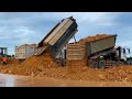 Great Extremely Overload Truck Pour Soil To Prevent Water From Rising On The Road