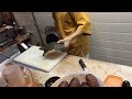 スッポンが自分のカラダに噛み付く スッポンを捌く