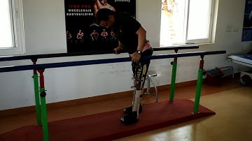 spinal injured T9 Complete paraplegia parallel bar walking skills