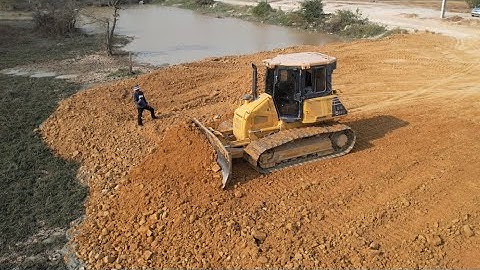 Updating processing action techniques skill dozer push spreading soil and dump truck unloading soil