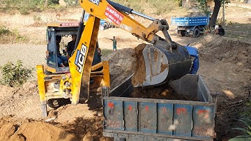 JCB Backhoe Loader Cutting Soil and Loading in Tractor - JCB Backhoe Working For Road Construction