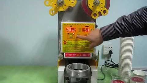 Máy dán nắp cốc trà tự động ET-H1, máy dán miệng ly  trà sữa LH 0982581 366