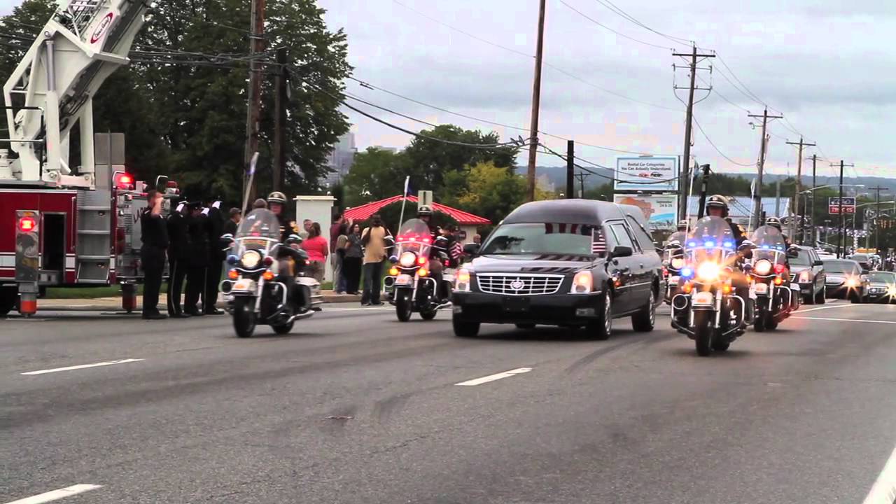 Funeral procession leads Szczerba past headquarters [Delaware Online News Video]