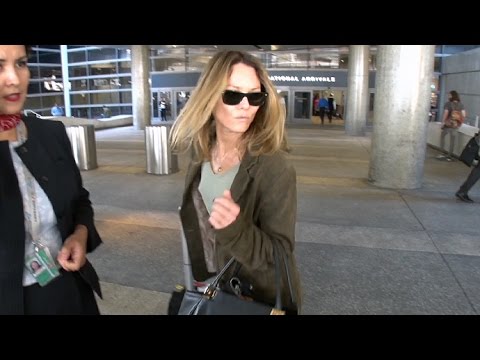 Exclusive - Vanessa Paradis Appears Upset When Asked If She's Reuniting With Johnny Depp At Lax