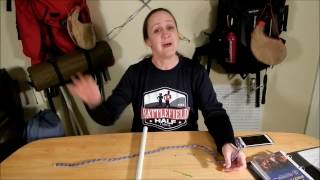 CubScout Eric's Mom demos double half hitch - Cubscout Eric