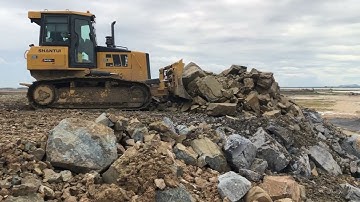 Amazing SHANTUI Bulldozer clearing And Pushing  Rock For Slope Protection.