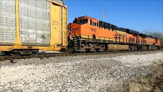 BNSF 4504 and BNSF 7990 lead a autorack train east in Aurora IL
