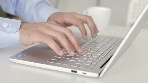 Close Up of Hands Typing On Laptop | Stock Footage - Videohive