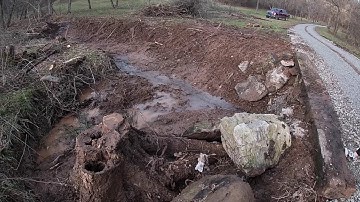 Replacing old culvert with new 3 ft plastic before and after
