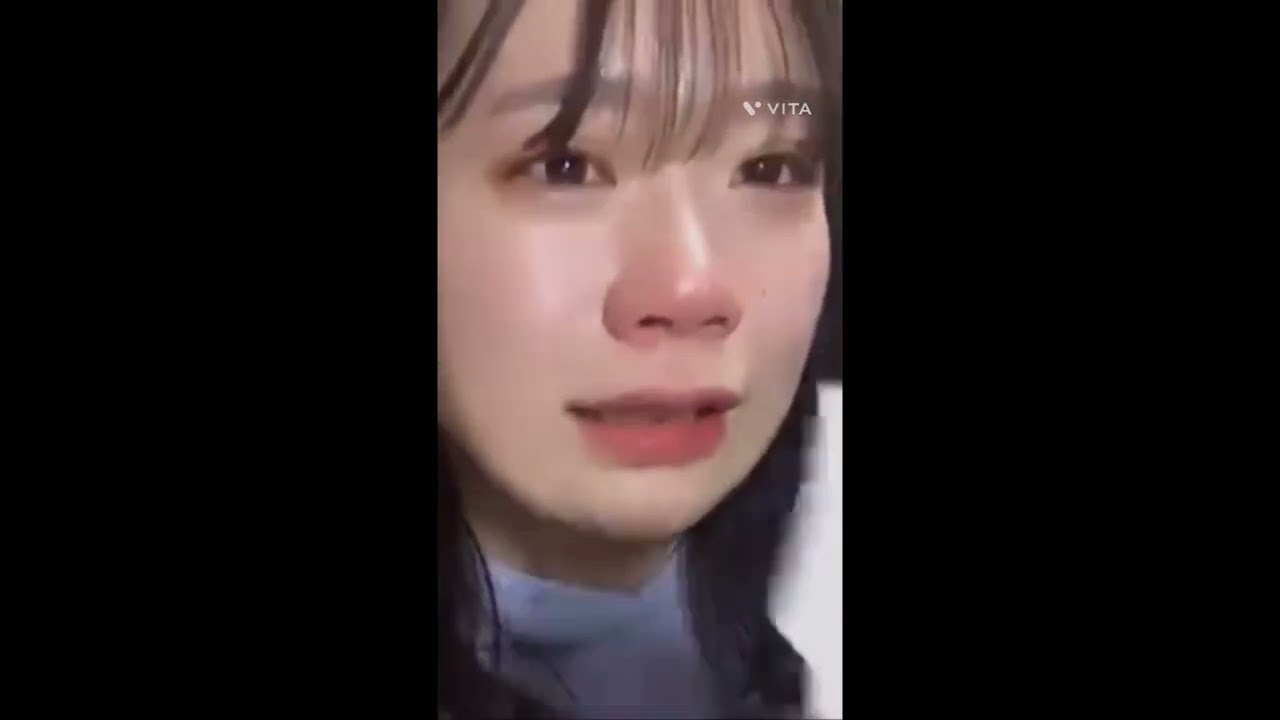 beautiful wonen blowing nose