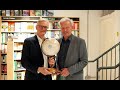 Colin Thubron presents Nicholas Crane with the Outstanding Contribution to Travel Writing Award