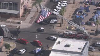 Honor Guard escorts Peoria officer's body to Maricopa County's medical examiner's office