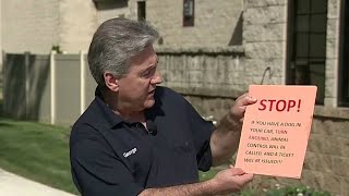 New signs warn shoppers not to leave dogs in hot cars