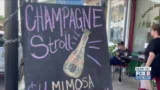 Bottles popped for the annual Mother's Day weekend Champagne Stroll