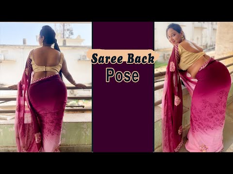 back side photo without face. Long focus. Far away kerla big boobed , curvy  girl in saree