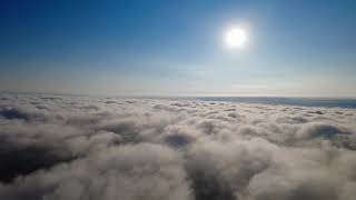 FLYING THROUGH MORNING FOG TO BLUE SKIES