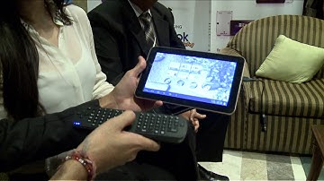 Byond CEO Mr. Prashant Bora explains the use of Air Mouse to Zarine Khan