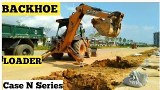 Backhoe loader Case N Series Korek lobang pokok