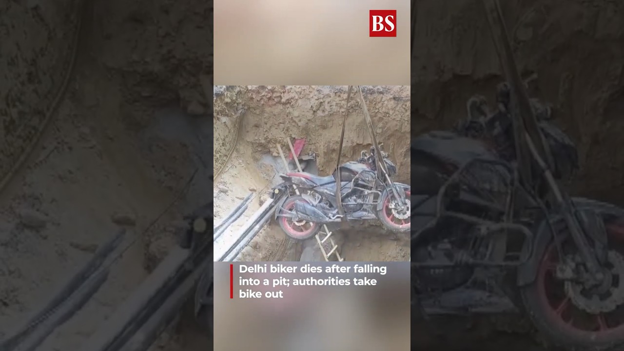 Video | Delhi biker dies after falling into a pit; authorities take bike out