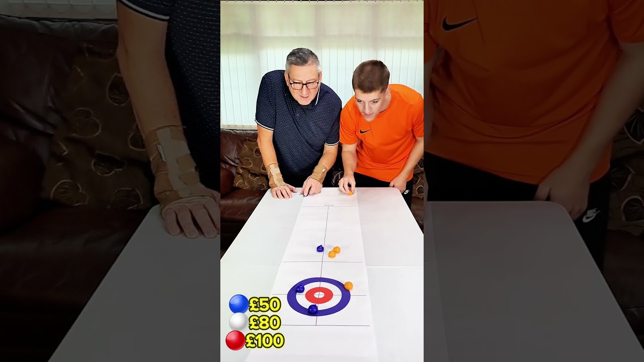 DAD VS SON TABLE CURLING 