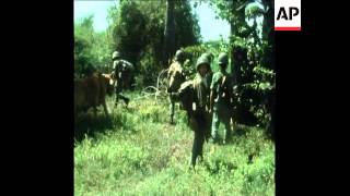 SYND19/11/71 WOUNDED DROPPED BY HELICOPTER TO AMBULANCES, TROOPS IN FIELD OPERATION