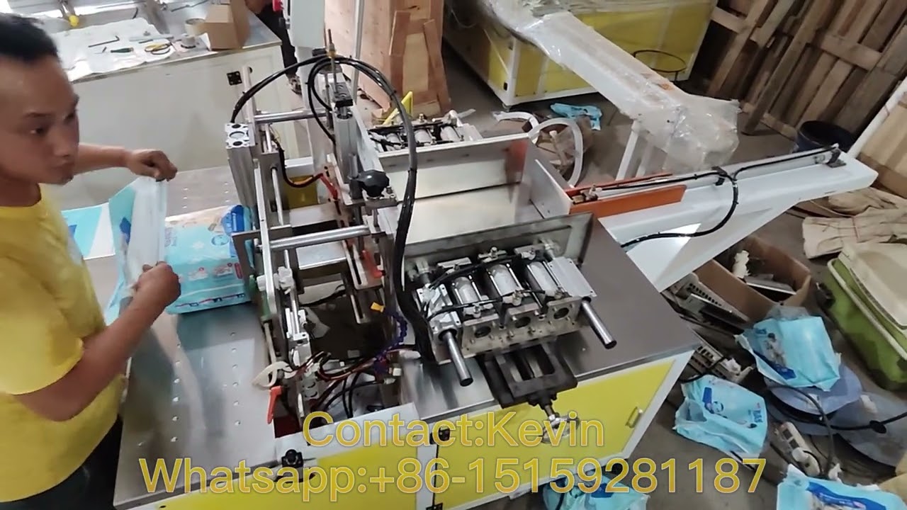 Semi Auto Jumbo Baby Diaper Packing Machine  Whatsapp: +86-15159281187