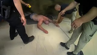 New video shows police saving man from house fire he allegedly set intentionally