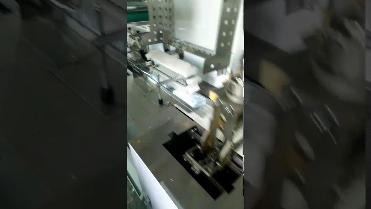 automatic 50pcs per bag face mask packing machine