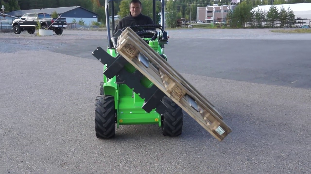 Avant loader Attachment Rotator - YouTube