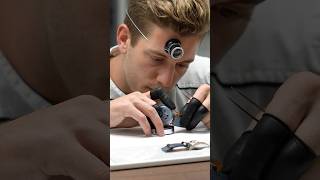 IWC watchmaker Thomas Zimmermann at the bench, assembling the Portugieser Perpetual Calendar.