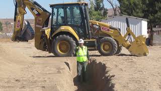 CAT Backhoe Trench By Operator Garrison