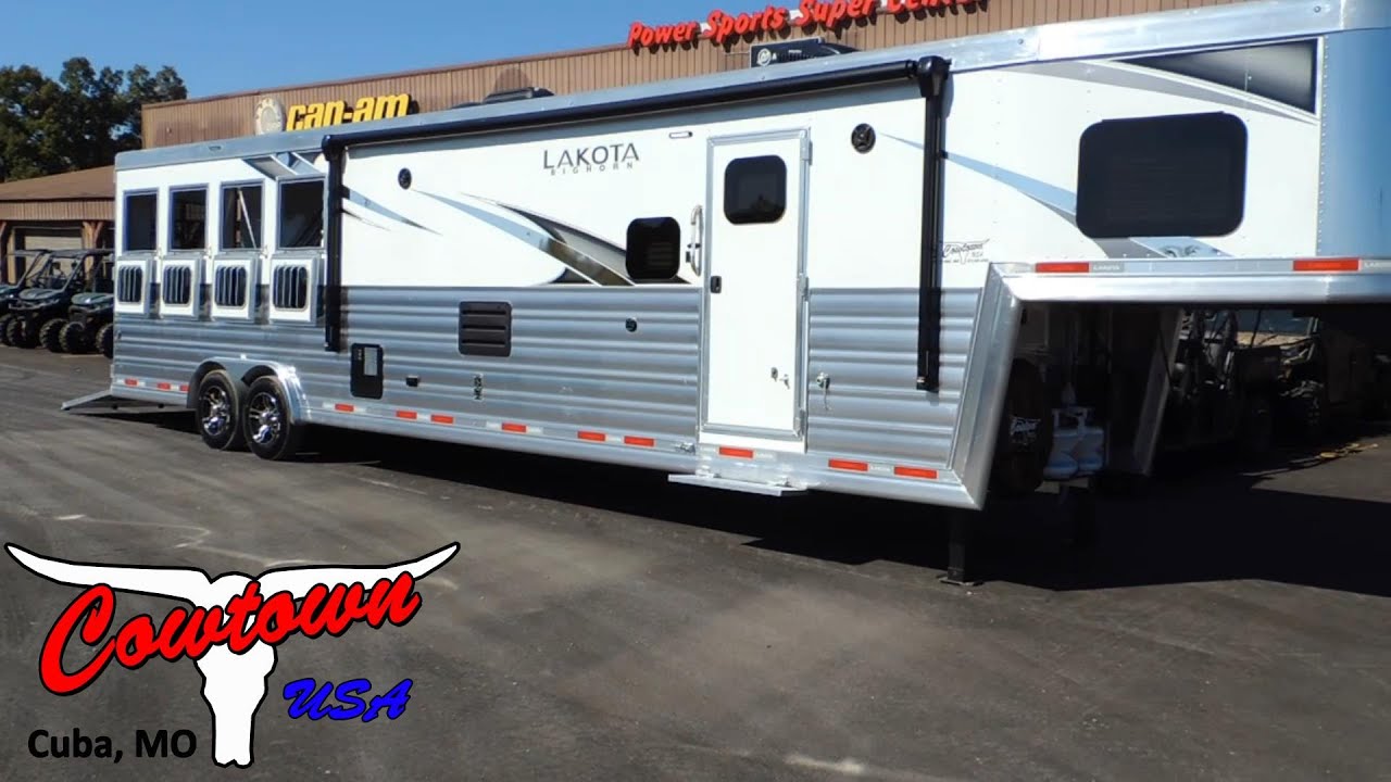2023 Lakota Bighorn 4 Horse Trailer in White with a Slide