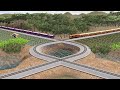 Four Colorful Trains Crossing the Round Rail & Cross X | Trainz Railfans IN