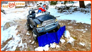 Plowing snow with power wheels truck, winter storm cleanup, and shoveling. Educational | Kid Crew