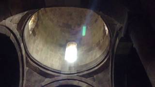 Armenia. Noravank. 800 year old church. Prayer in Armenian language 3