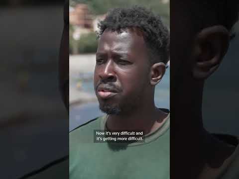 Migrants wait in Ceuta after mass border crossing